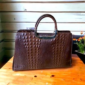 Handbag in leather made in italy with embossed croco design